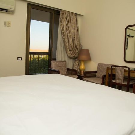 Mg Nefertiti Hotel Al Minya Bagian luar foto