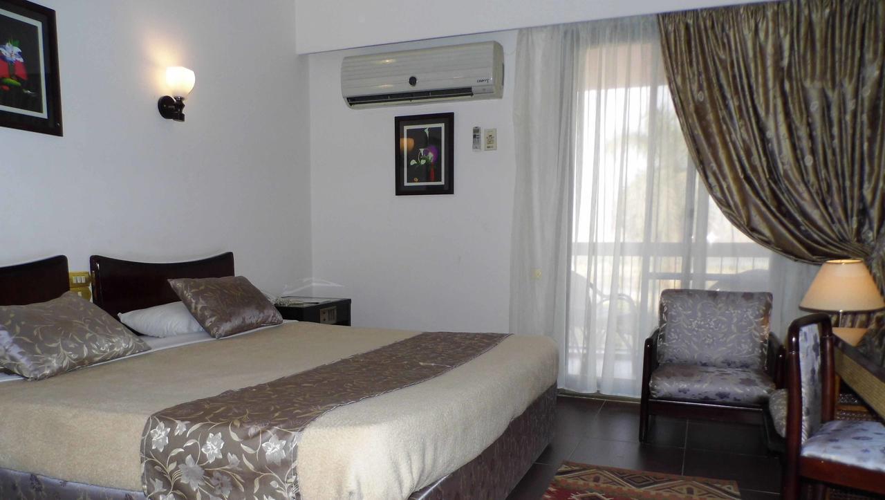 Mg Nefertiti Hotel Al Minya Bagian luar foto