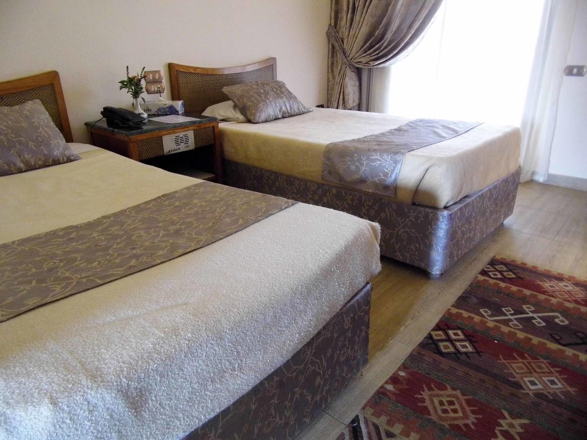 Mg Nefertiti Hotel Al Minya Bagian luar foto