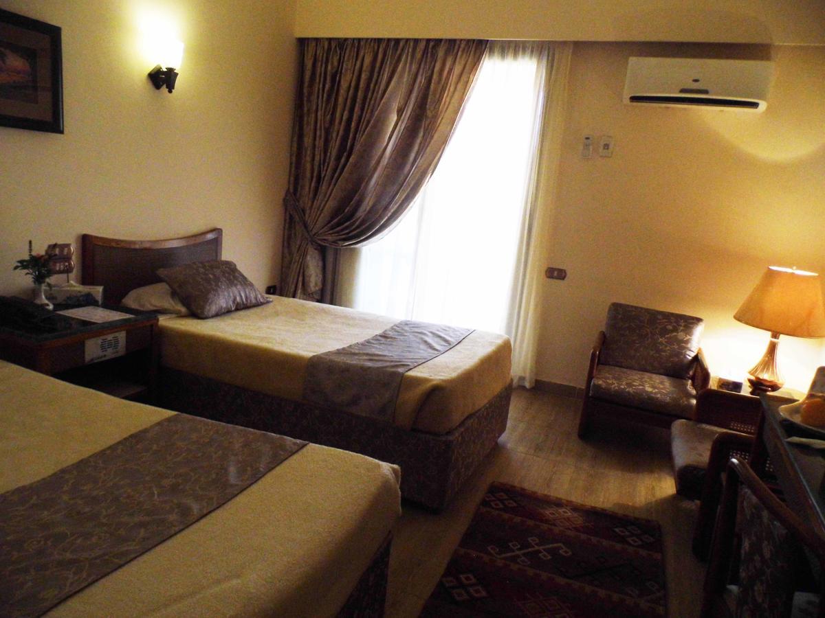 Mg Nefertiti Hotel Al Minya Bagian luar foto